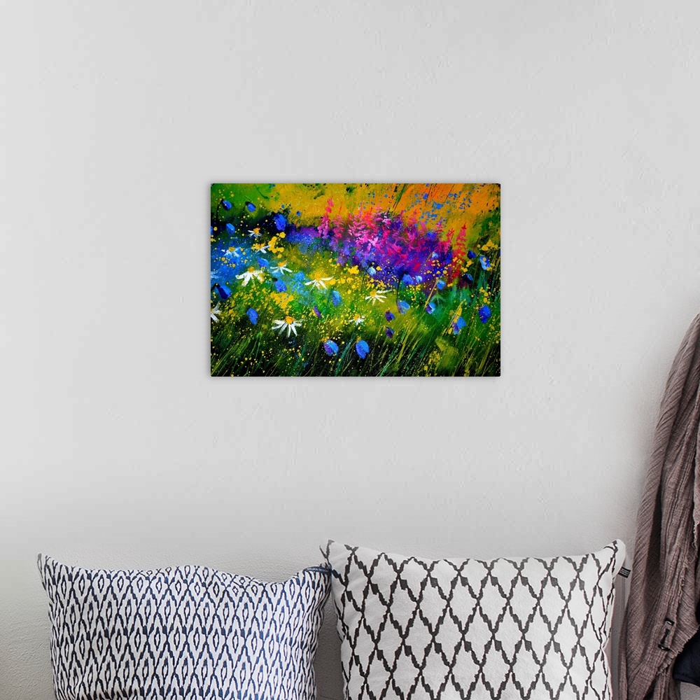 A bohemian room featuring Horizontal painting of colorful flowers in a garden with small speckles of paint overlapping.