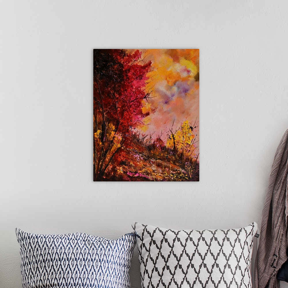 A bohemian room featuring Vertical painting of a group of red leaved trees in the fall with speckles of paint overlapping.