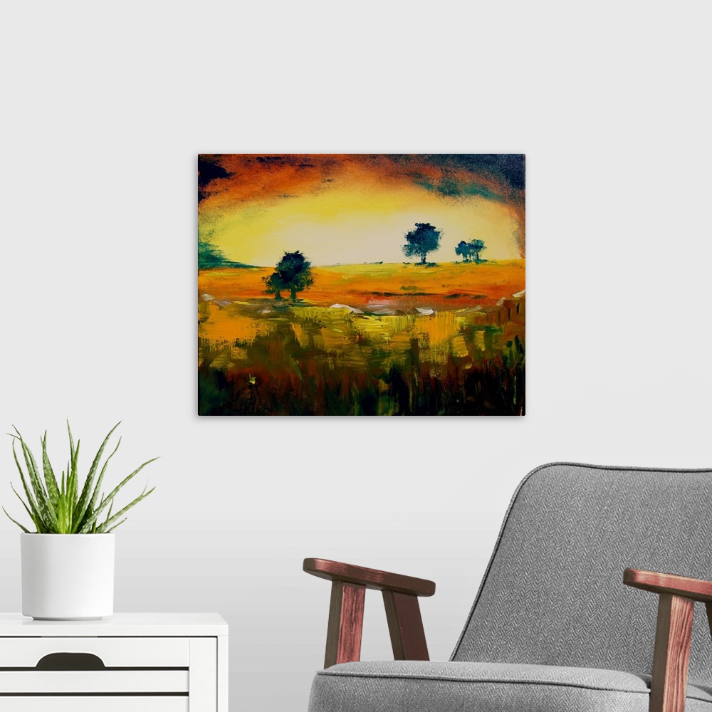 A modern room featuring A horizontal landscape of rolling fields with a few trees in vibrant, warm colors.