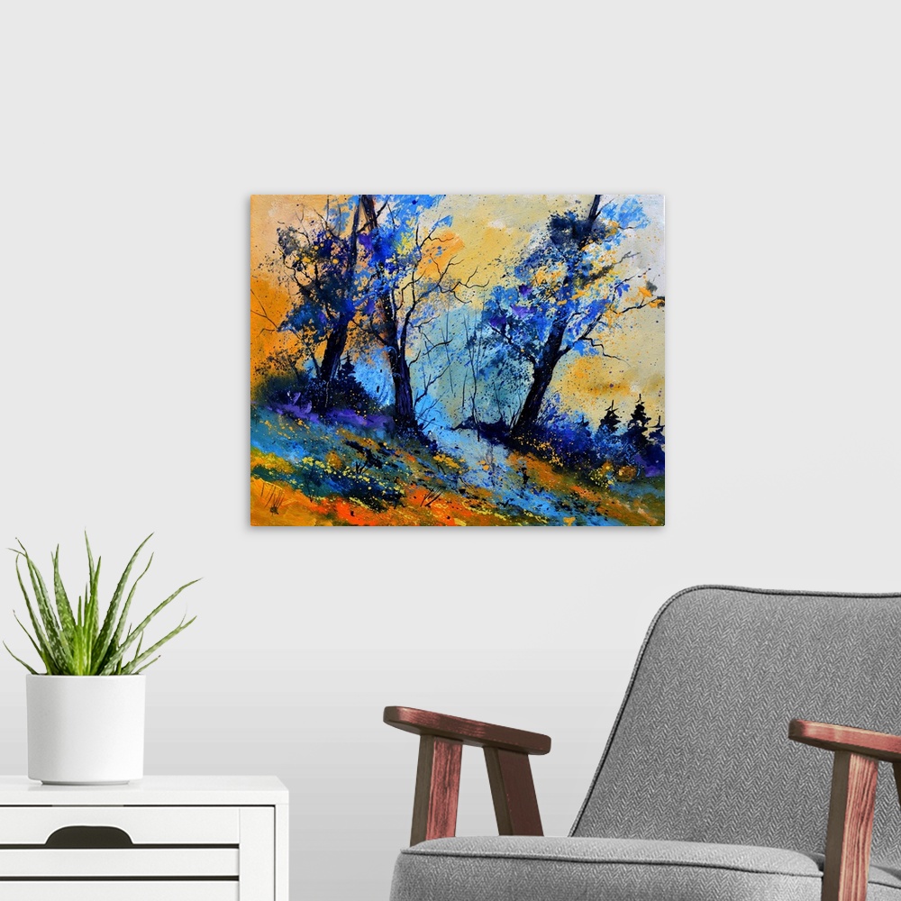 A modern room featuring Vibrant painting of blue leaved trees, a colorful sky, and orange grass in the foreground.