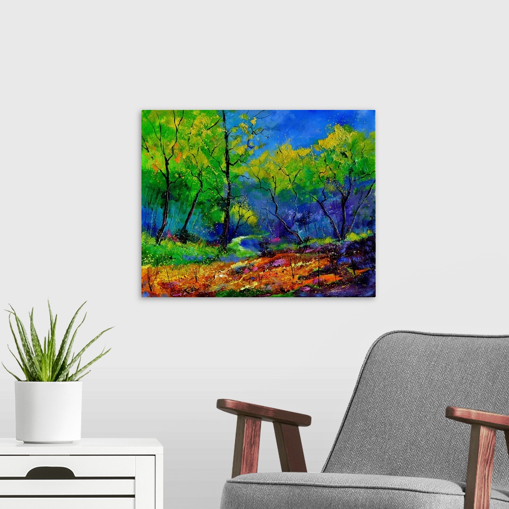 A modern room featuring Vibrant painting of a colorful path through a forest of green leaved trees and a bright blue sky.