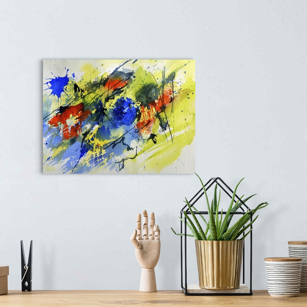 A bohemian room featuring Abstract painting in shades of black, blue, red and yellow with splatters of paint overlapping.