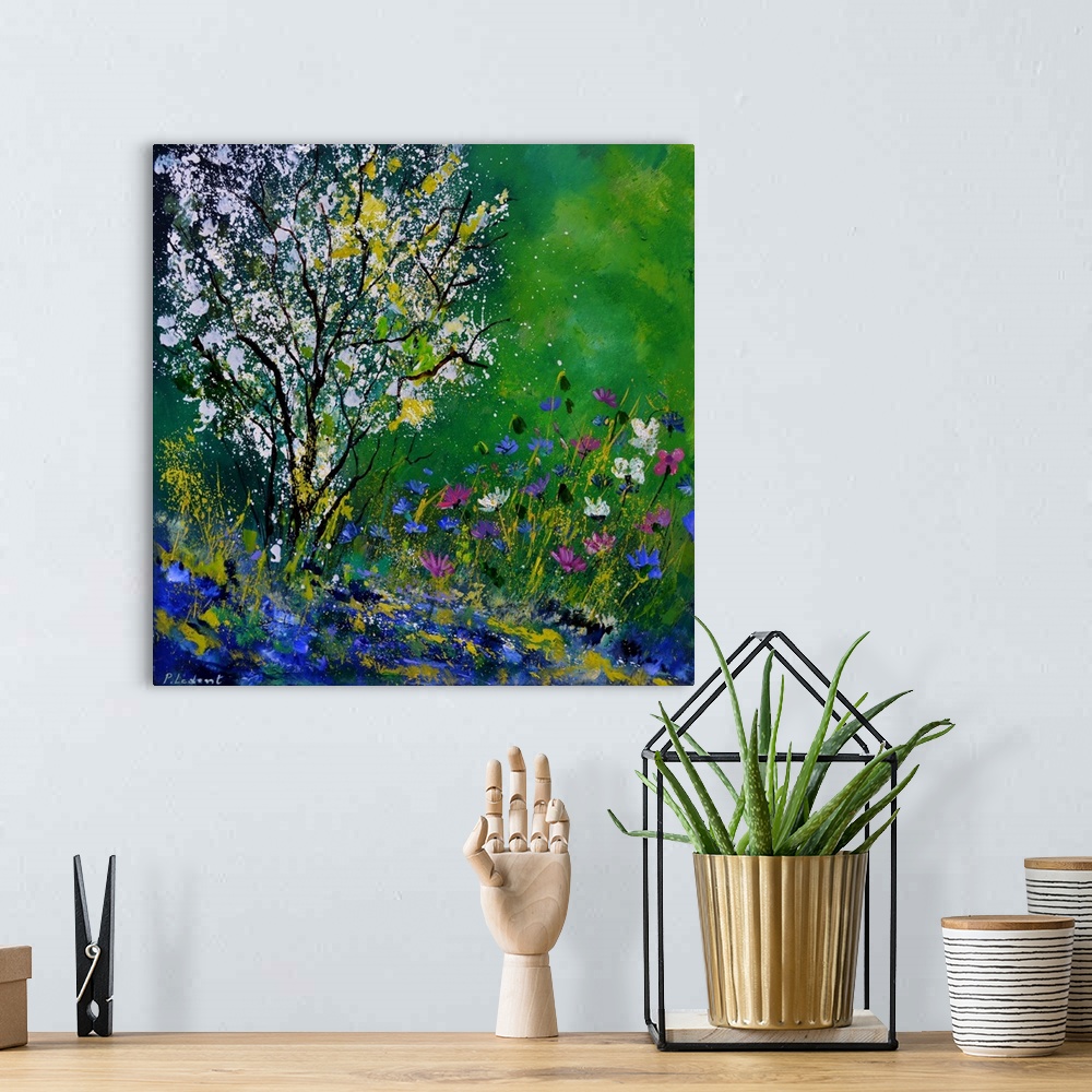 A bohemian room featuring Square painting of colorful Spring wildflowers and a tree with white blossoms in an abstract style.