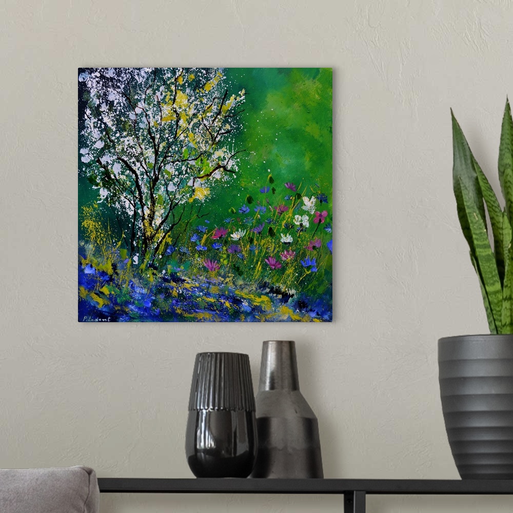 A modern room featuring Square painting of colorful Spring wildflowers and a tree with white blossoms in an abstract style.