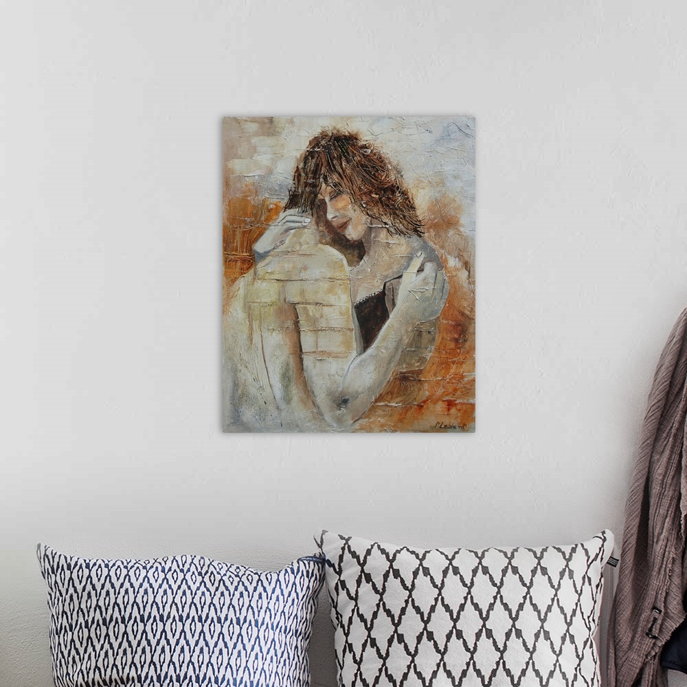 A bohemian room featuring A portrait of a couple embracing done in textured, neutral colors.