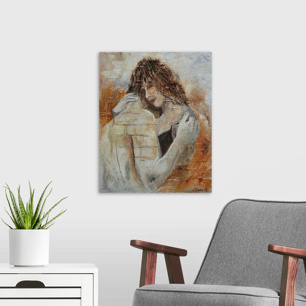 A modern room featuring A portrait of a couple embracing done in textured, neutral colors.