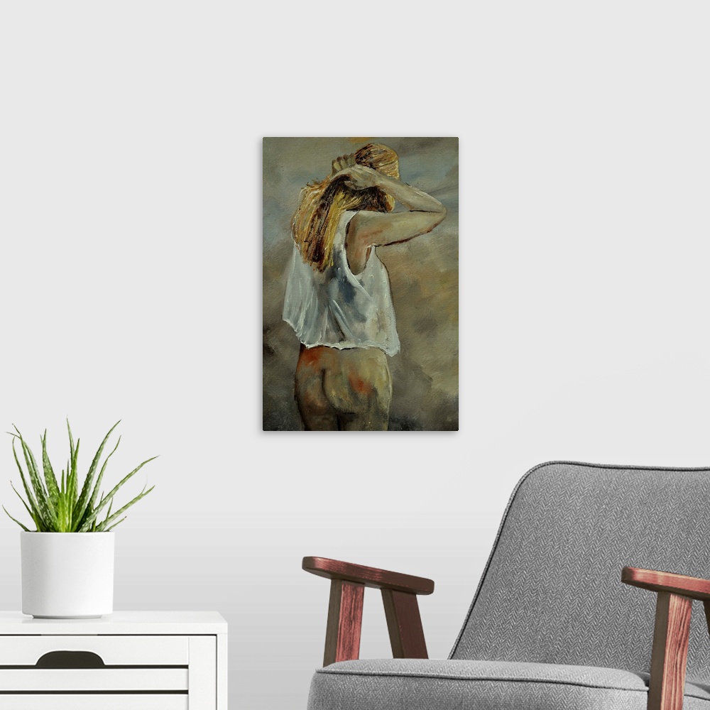 A modern room featuring A portrait of a woman wearing only a transparent shirt as she adjusts her hair, with her back tow...