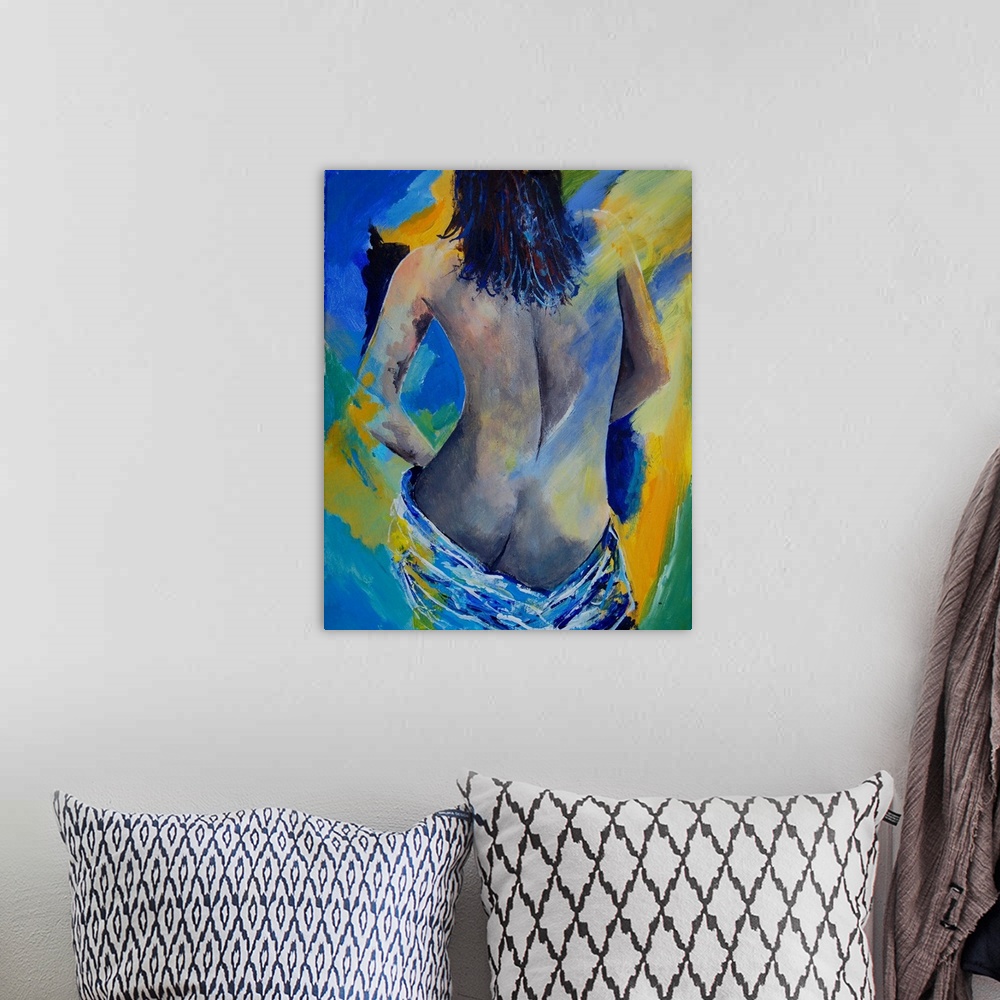 A bohemian room featuring A nude painting of the back of a woman draped in a white cloth in textured colors of blue and yel...