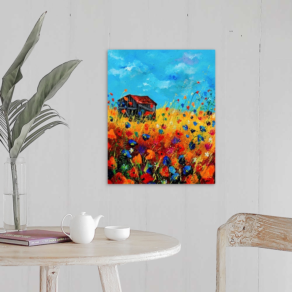 A farmhouse room featuring Vertical painting of a field of orange and blue poppies with a barn and splatters of multi-color ...