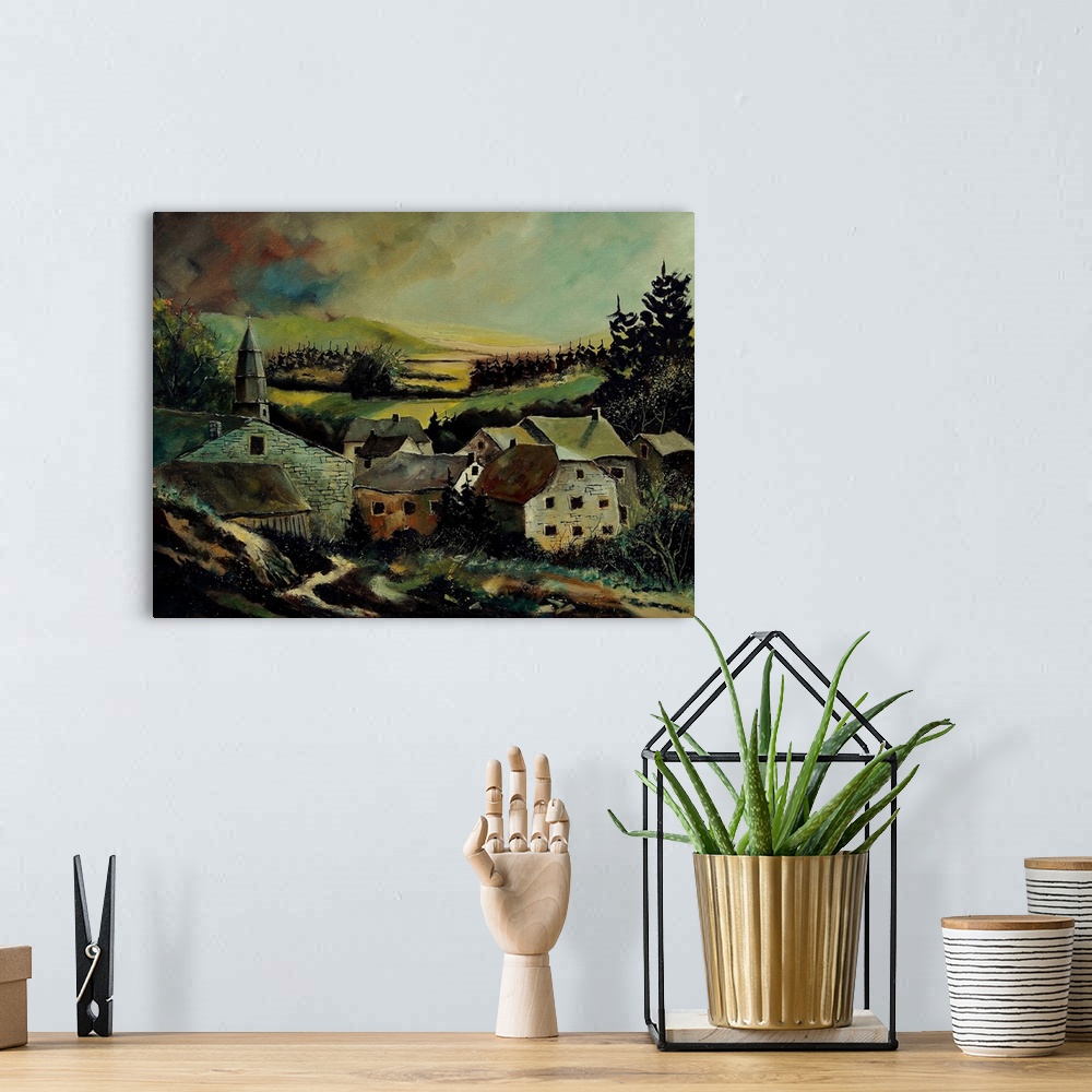 A bohemian room featuring A low pitched painting of a village in Belgium.