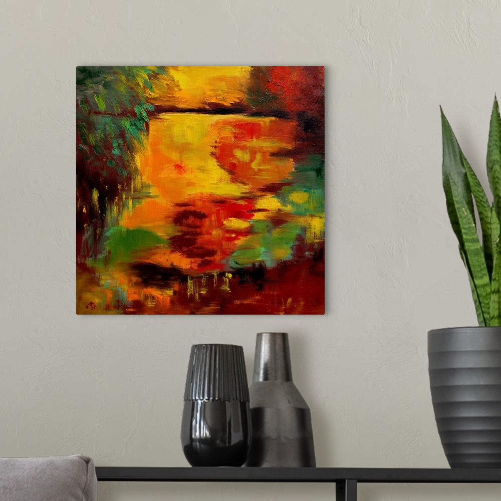 A modern room featuring A square abstract landscape of a pond with vivid colors of yellow and orange.