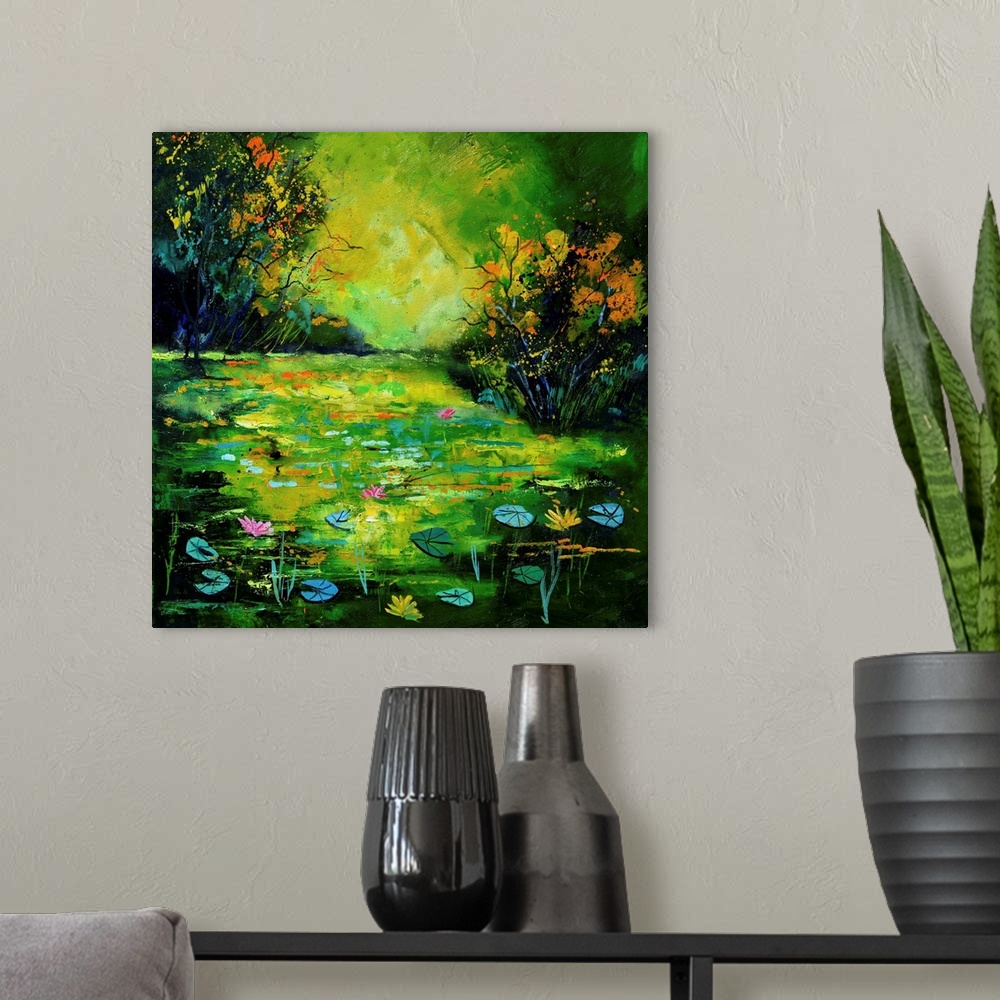 A modern room featuring Square painting of a pond scene with blue and green water lilies as well as flower blooms and sma...