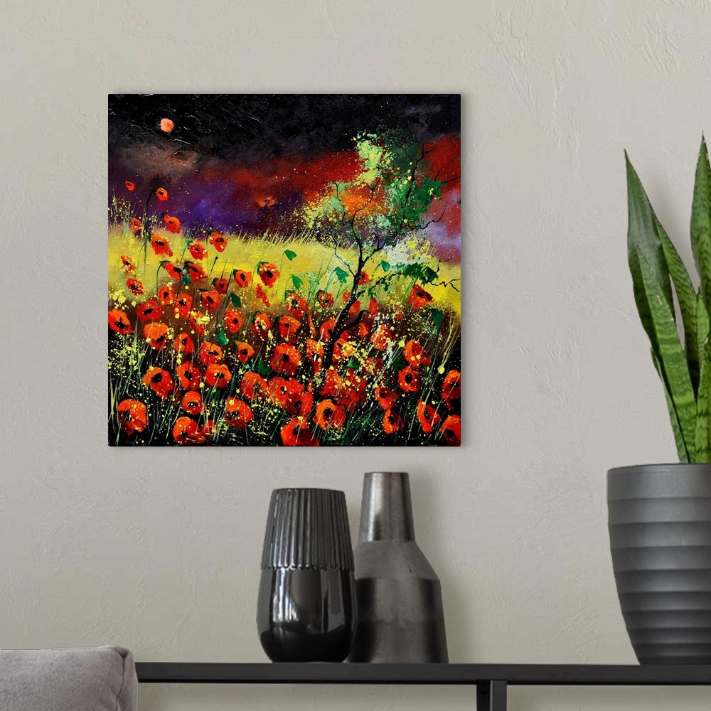 A modern room featuring Vibrant painting of red poppies in a filed with a dark, red sky in the distance.