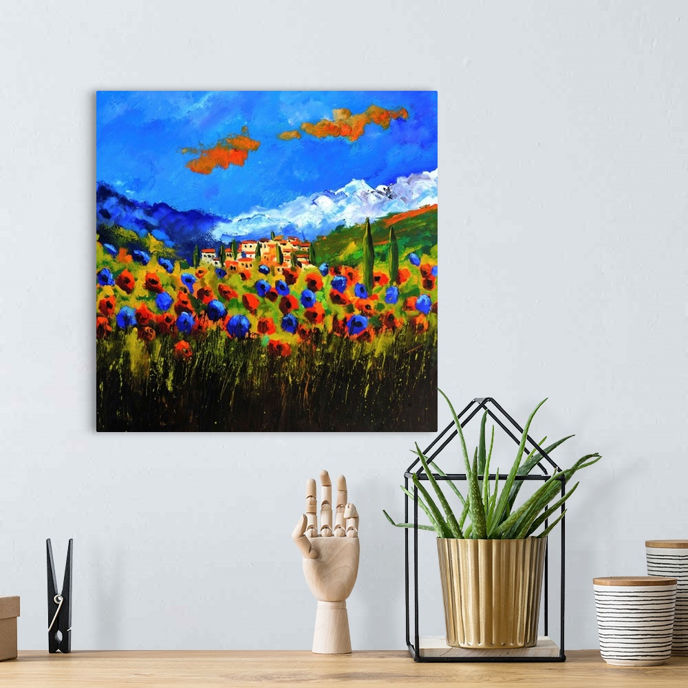 A bohemian room featuring Vibrant painting of a bright Summer day with blossoming poppies, a colorful sky, and the village ...