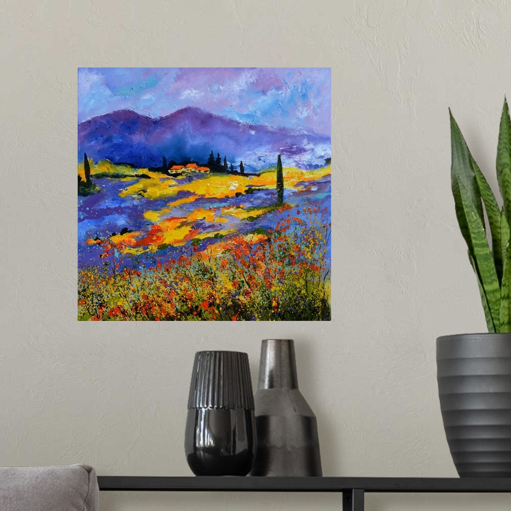 A modern room featuring Vibrant painting of a bright Summer day with blooming flowers in a field, a colorful sky, and vil...