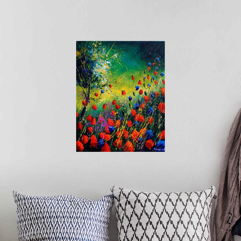 A bohemian room featuring Vertical painting of a field of red and blue poppies along with a single tree with splatters of m...