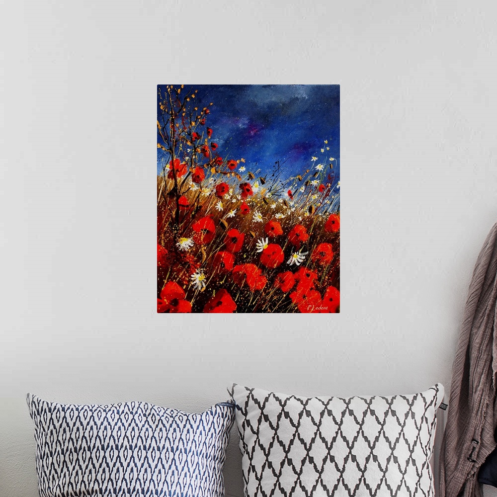 A bohemian room featuring Vertical painting of a field of red poppies with splatters of multi-color paint overlapping the i...