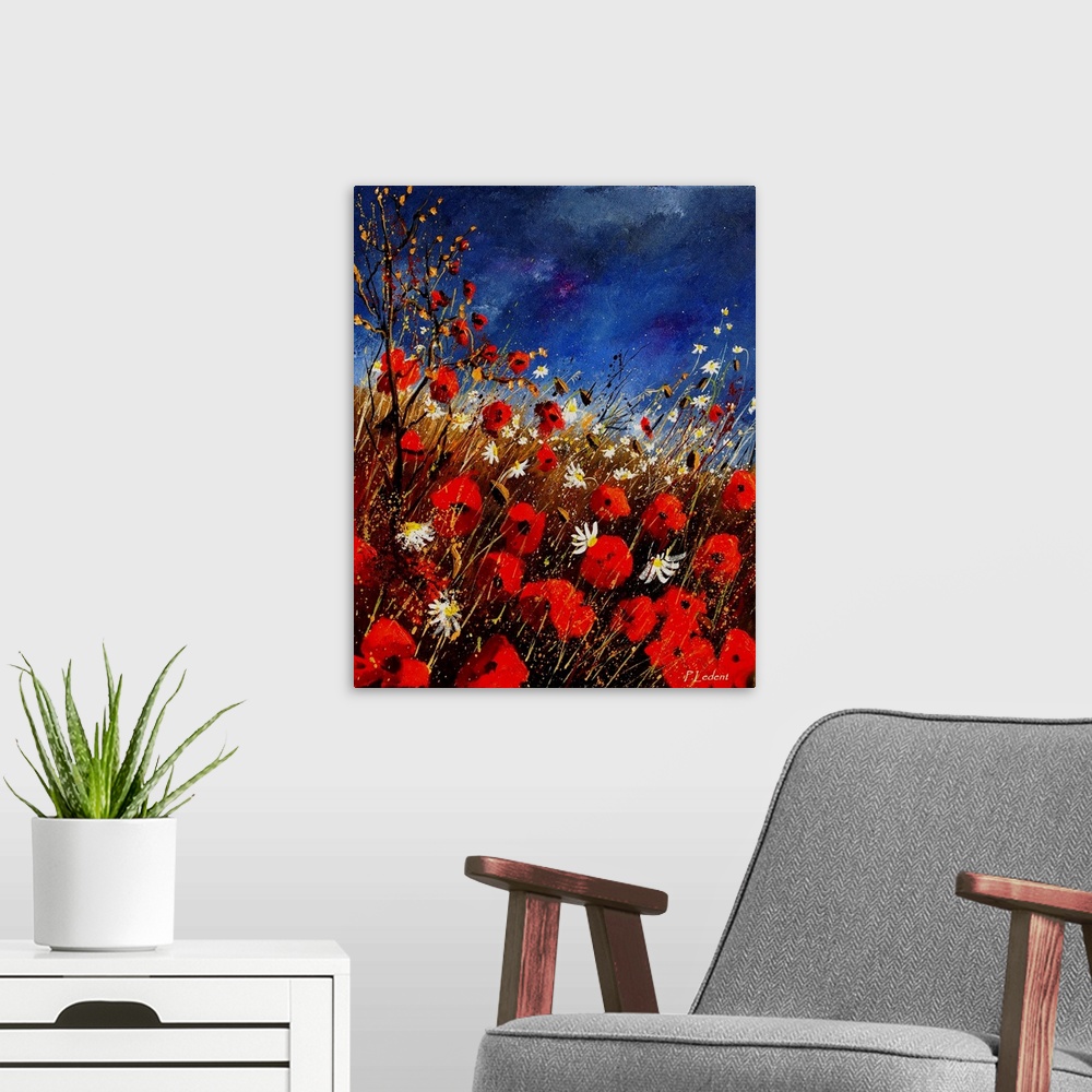 A modern room featuring Vertical painting of a field of red poppies with splatters of multi-color paint overlapping the i...