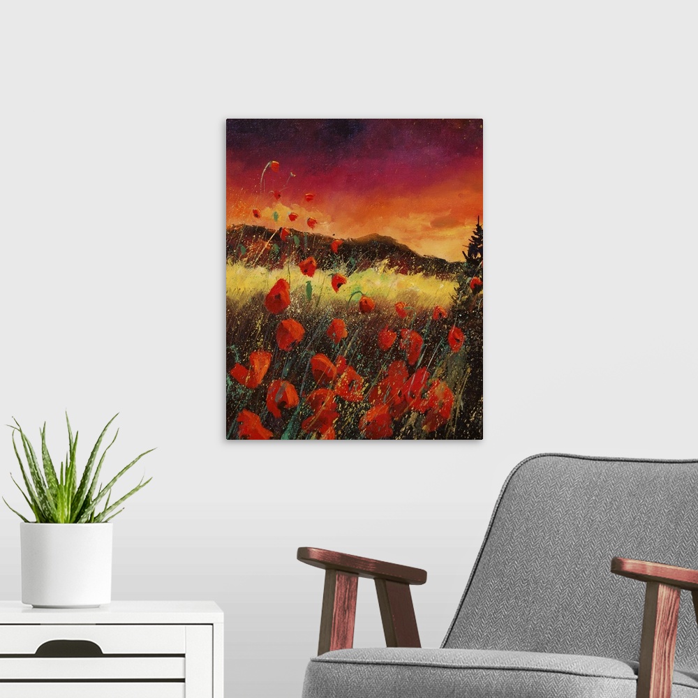 A modern room featuring Vertical painting of an vibrant landscape with red poppies in the foreground and a bright warm sk...