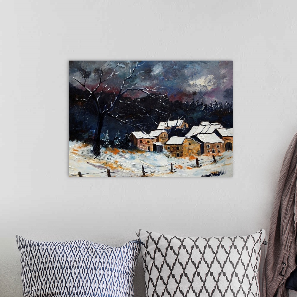 A bohemian room featuring A horizontal abstract landscape of a snowy village at night.