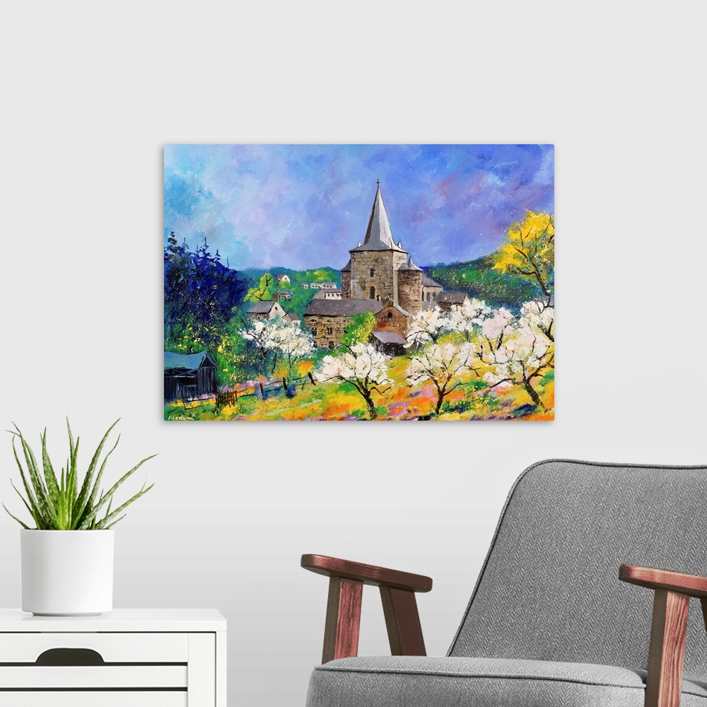 A modern room featuring Horizontal painting of a spring landscape with white blooming trees in the foreground and a villa...