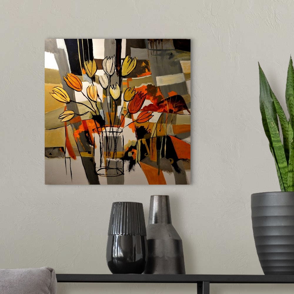 A modern room featuring Painting done in a cubism style of a large bouquet of flowers in colors of red, orange and yellow...