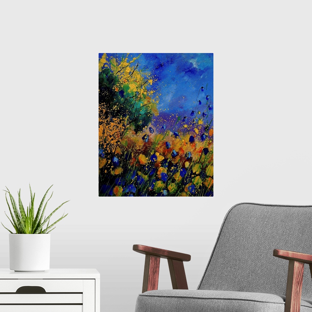 A modern room featuring Vertical painting of a field of wild flowers with splatters of multi-color paint overlapping the ...