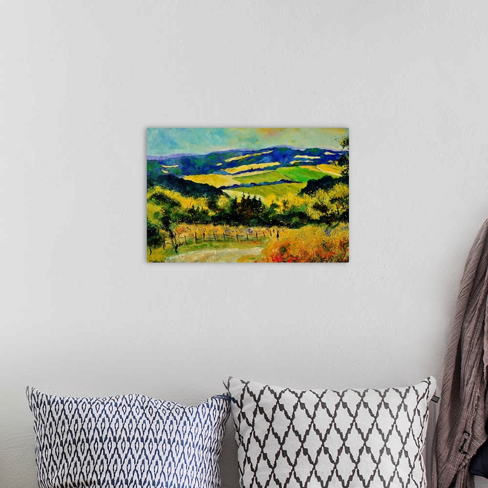 A bohemian room featuring Horizontal landscape of rolling fields in vibrant colors on a summer day.