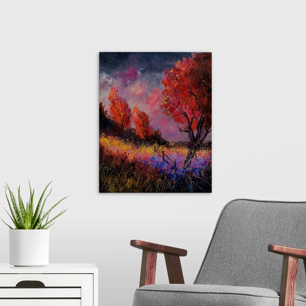 A modern room featuring Vertical painting of a field with red leaved trees and splatters of multi-color paint overlapping...