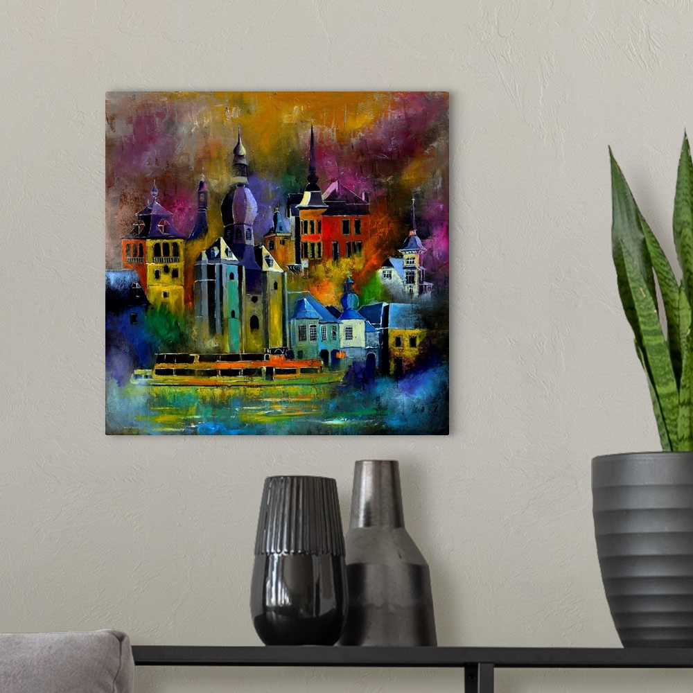 A modern room featuring Square painting of multi-color buildings in a city landscape.