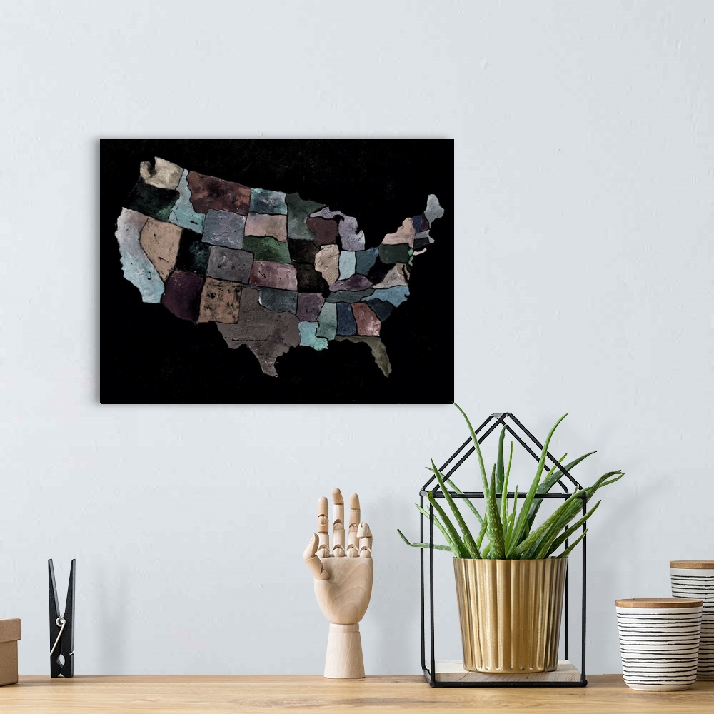 A bohemian room featuring Painting of the United States of America in multi-color paints in neutral colors against a black ...