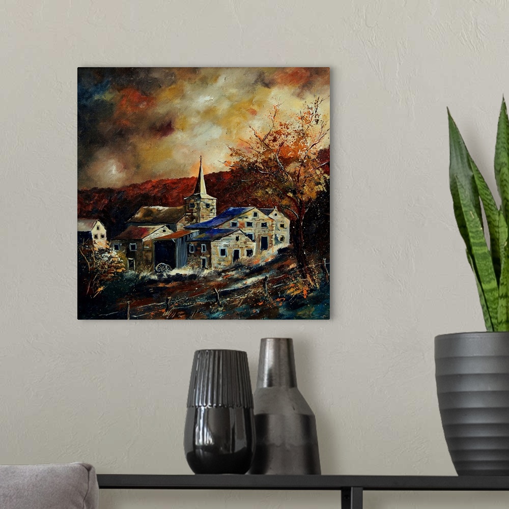 A modern room featuring Vertical painting of a darkened landscape with a field in the foreground and a Belgium village in...