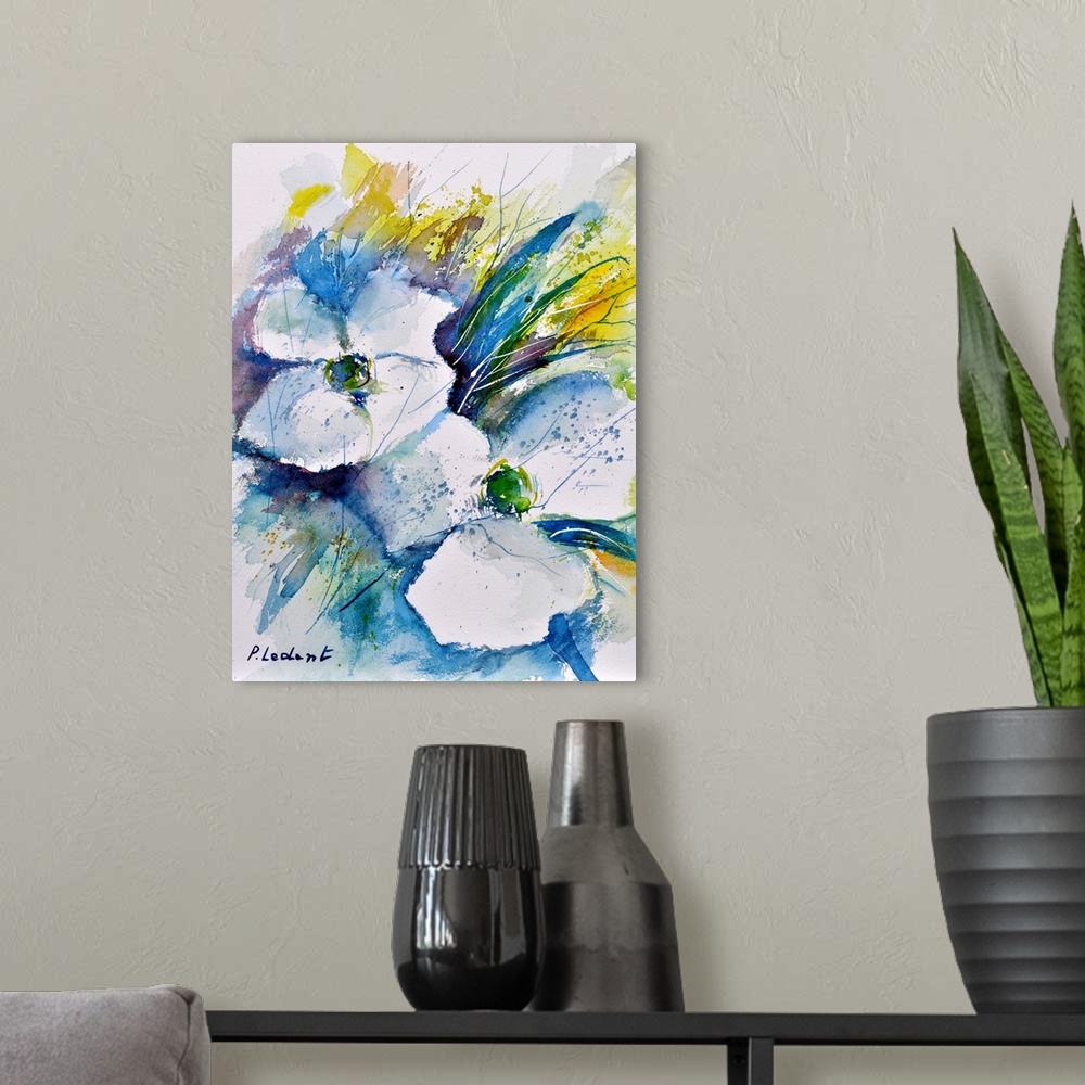A modern room featuring Vertical watercolor painting of white flowers and leaves done in shades of blue, green and yellow.