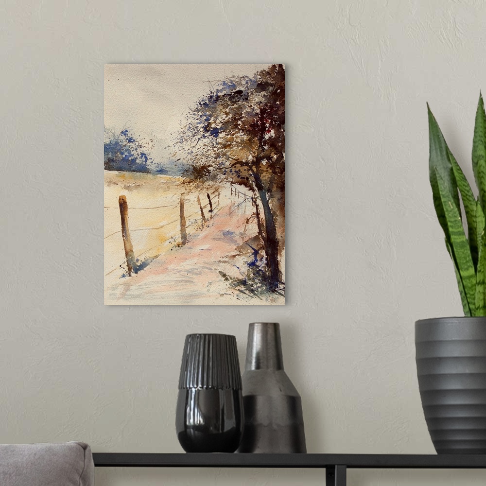 A modern room featuring A vertical watercolor painting of a fenced in field lined bya road and trees in the countryside i...