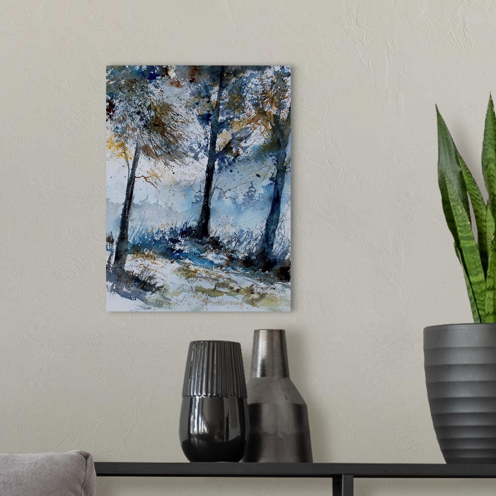 A modern room featuring A vertical watercolor landscape of a forest with muted speckled colors of brown and blue.