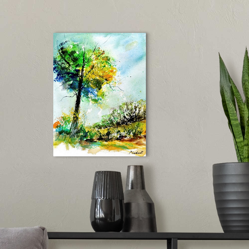 A modern room featuring A vertical watercolor landscape of a tree with vibrant speckled colors of yellow, green and blue.