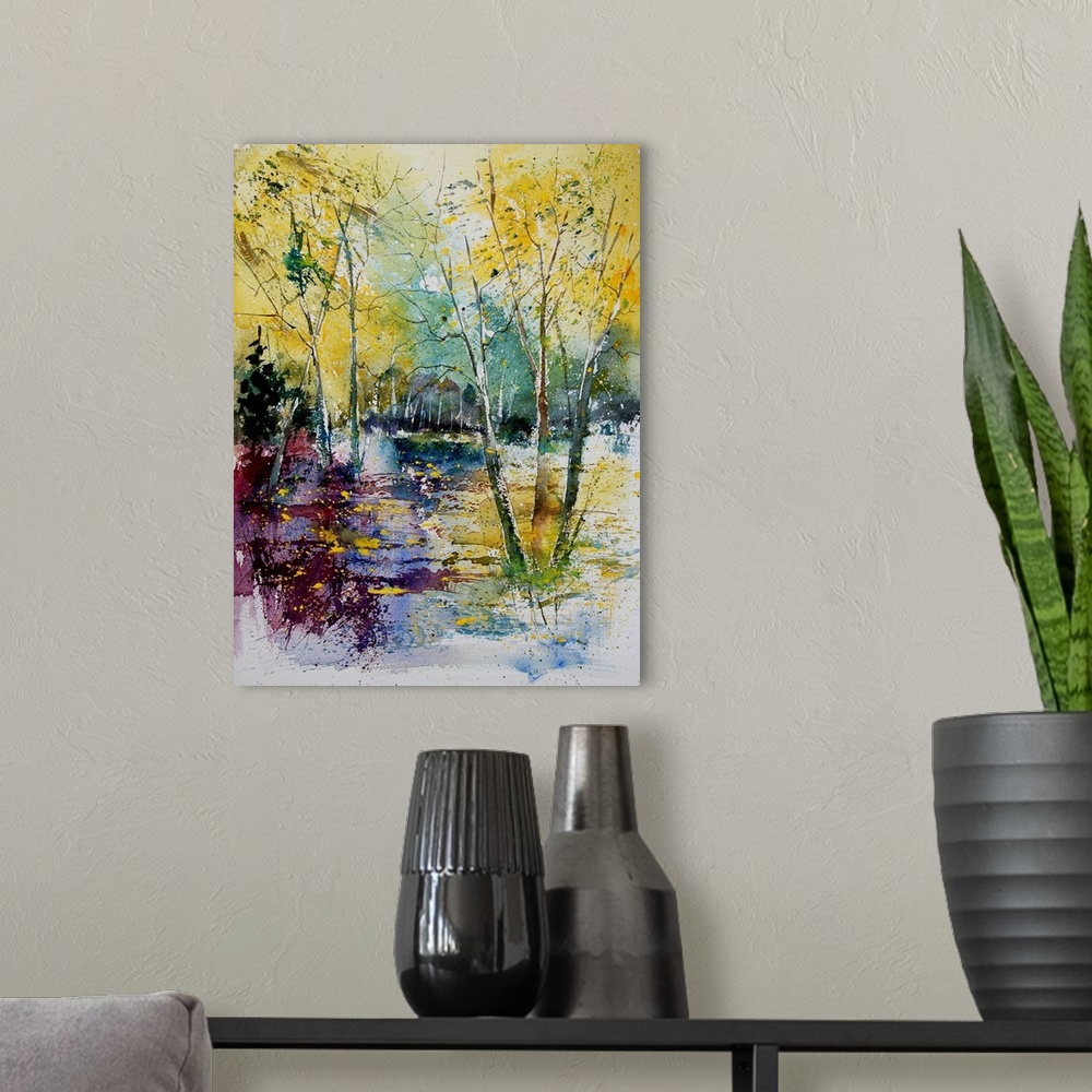 A modern room featuring Watercolor painting of a pond in a forest done in vibrant colors of yellow, green and blue.