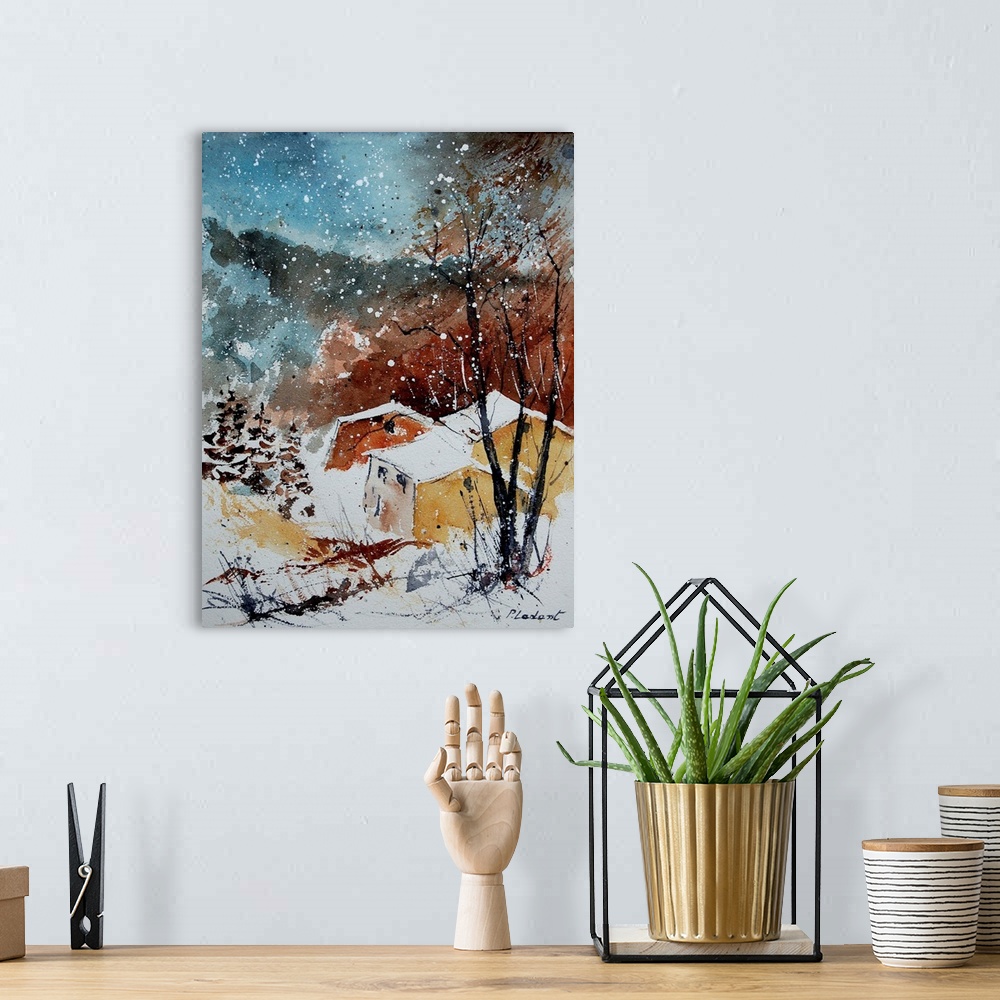 A bohemian room featuring A vertical abstract watercolor of a village with colors of brown, orange and blue.