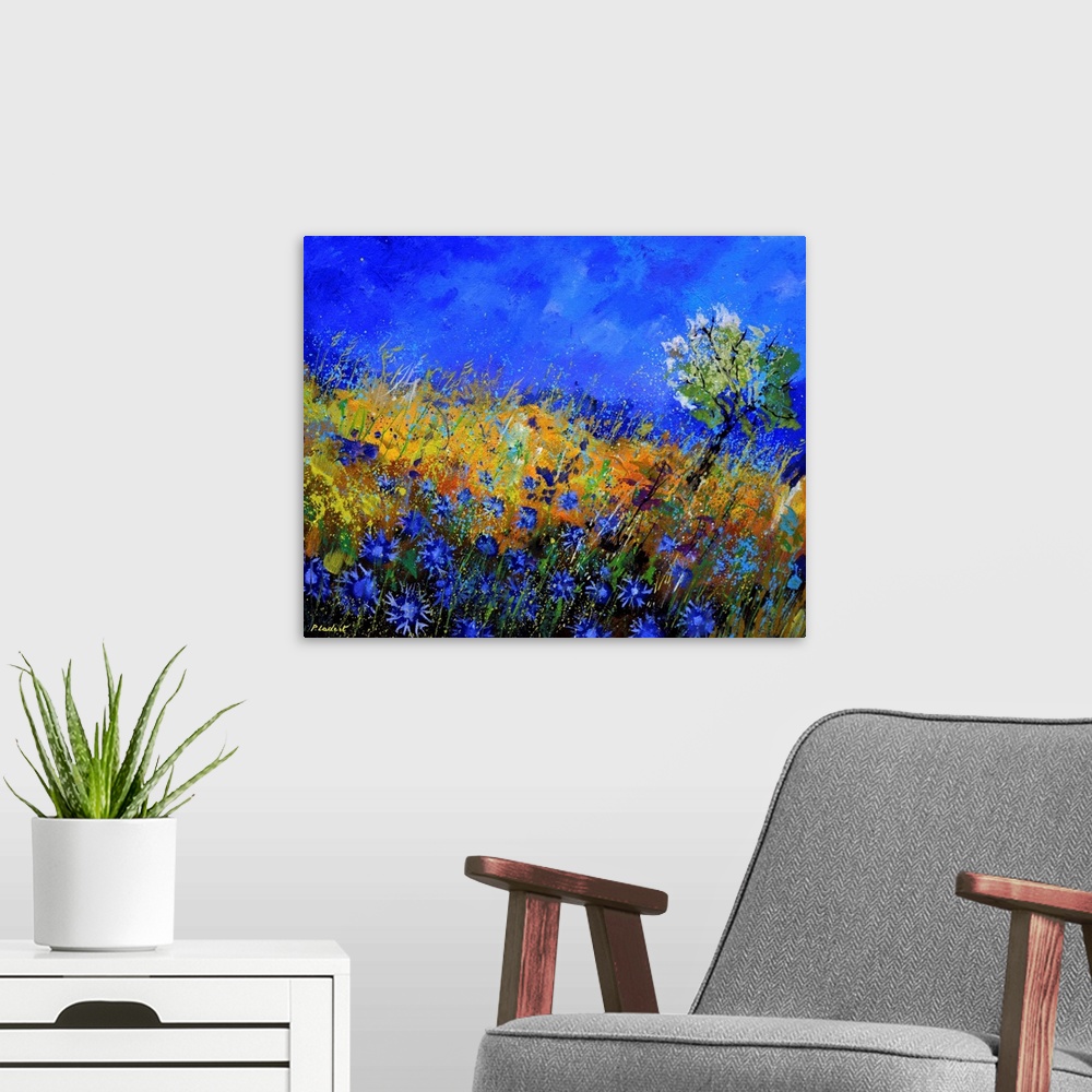 A modern room featuring Contemporary abstract painting of a field of blue flowers.