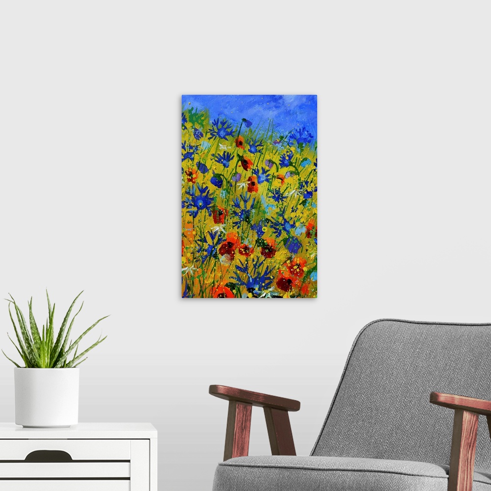 A modern room featuring Vertical painting of colorful flowers in a garden and a bright blue sky with small speckles of pa...