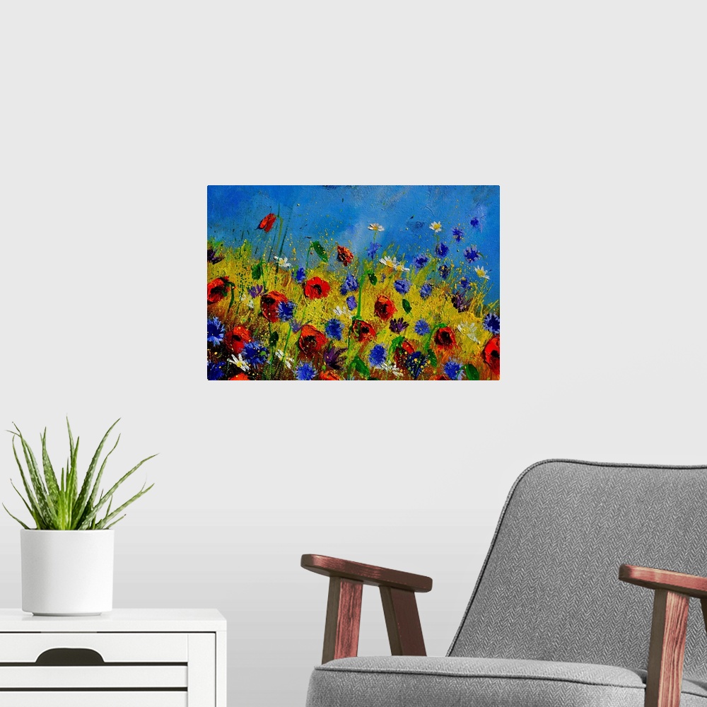 A modern room featuring Horizontal painting of colorful flowers in a field and a bright blue sky with small speckles of p...