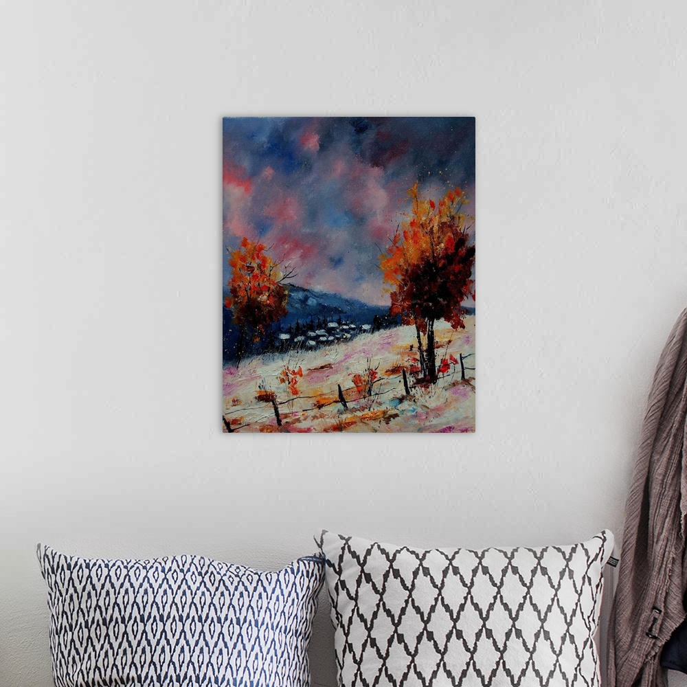 A bohemian room featuring Painting of a fenced snow cover field and vibrant red leaved trees with a pink and blue sky.