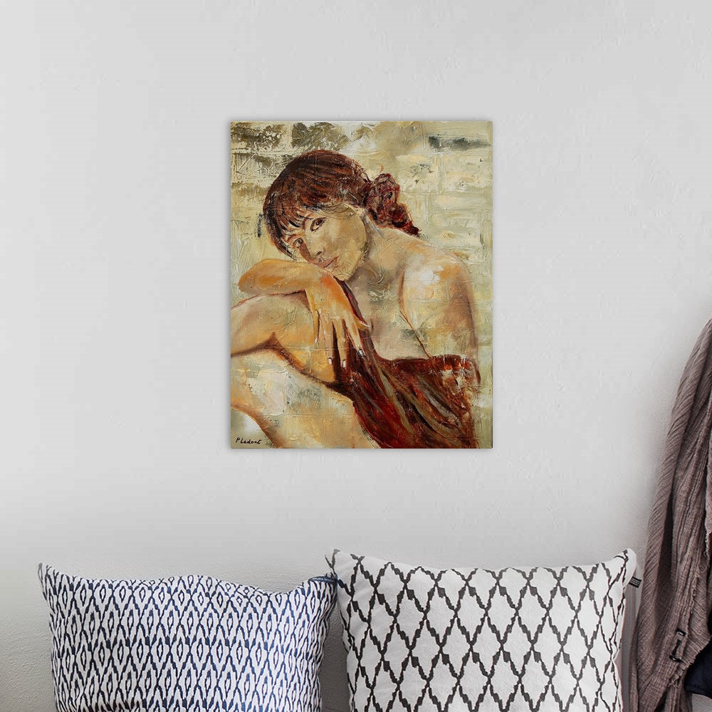 A bohemian room featuring A nude portrait of a woman sitting, painted in textured neutral colors.