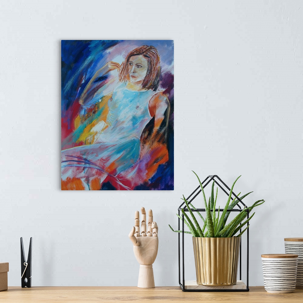 A bohemian room featuring A painting of a woman in white sitting, done in textured vibrant colors of orange, red, blue and ...