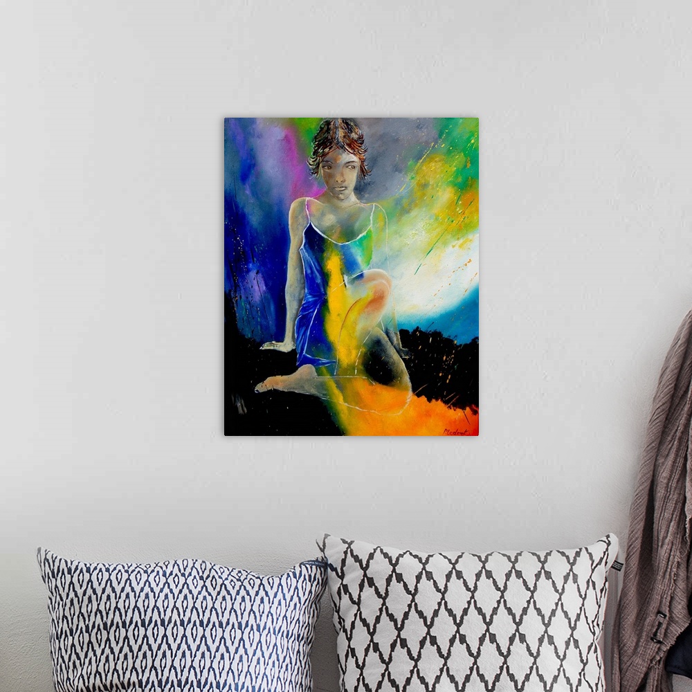 A bohemian room featuring A painting of a woman sitting in textured vibrant colors of orange, green, blue and yellow.