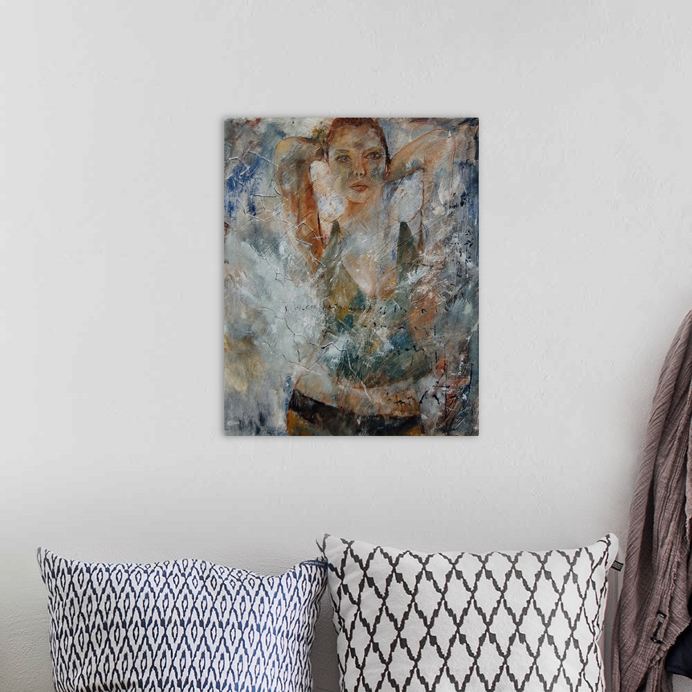 A bohemian room featuring A portrait of a woman painted in textured neutral colors.