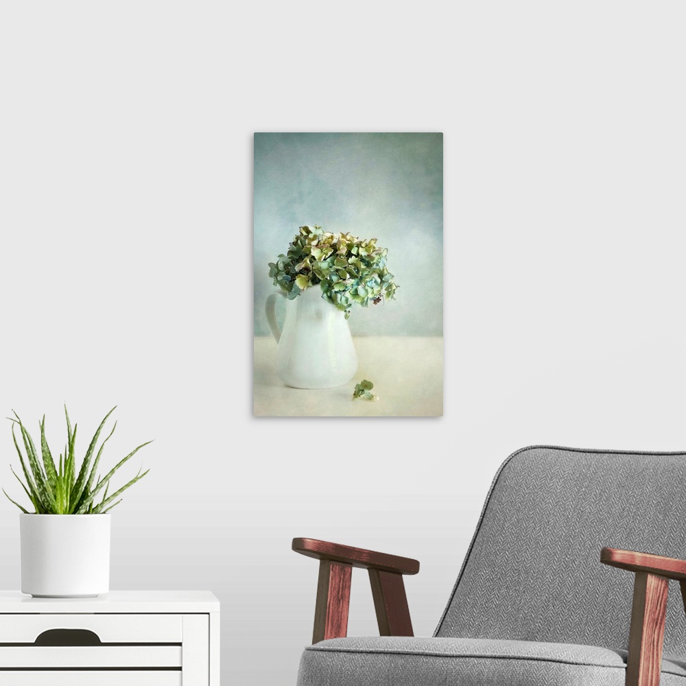 A modern room featuring Hydrangea flowers in a white mug