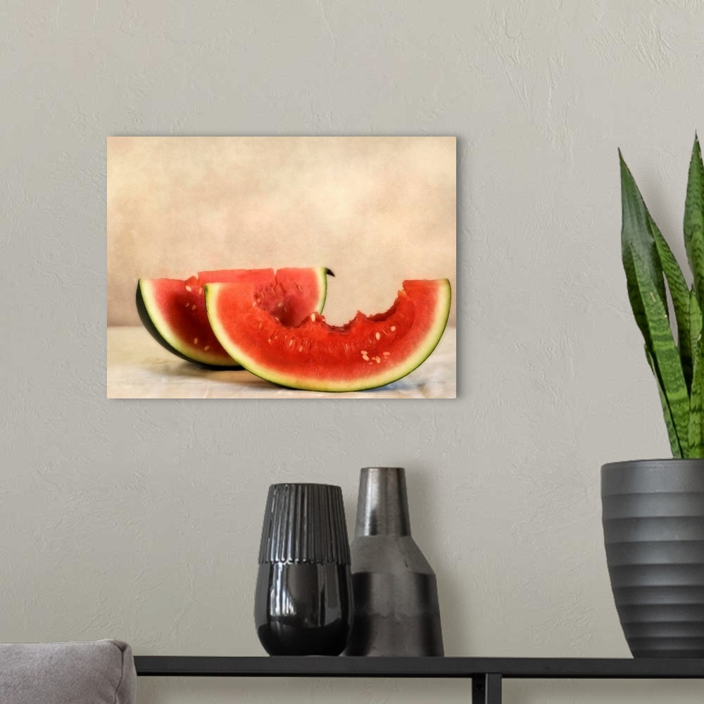 A modern room featuring Sliced watermelon, a summer treat