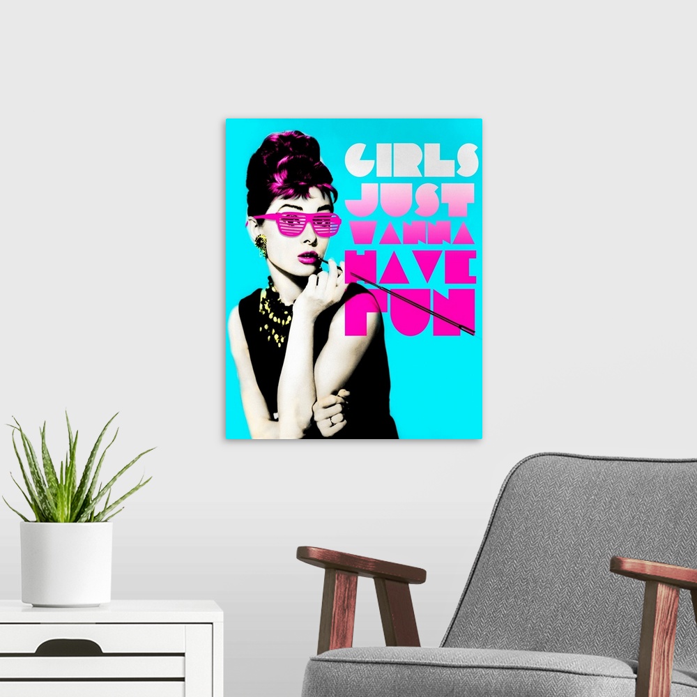 A modern room featuring Wall art of Audrey Hepburn wearing sunglasses with the text, ""Girl's just wanna have fun"".
