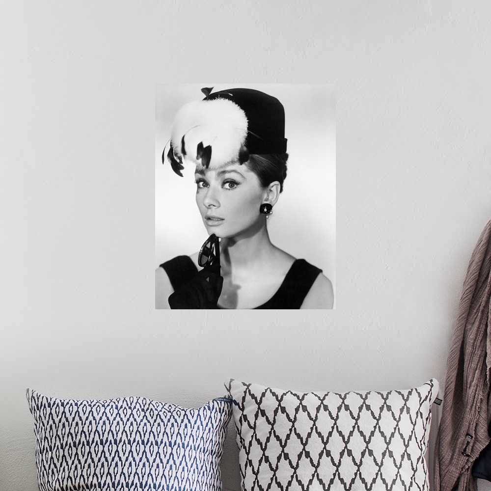 A bohemian room featuring This decorative wall art is a portrait photograph of the Hollywood actress in character as the se...